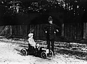 Boy in 1908 Mercedes pedal car