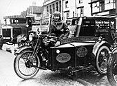 Woman riding a 1929 500cc AJS motorbike
