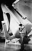 Edwin Powell Hubble, American astronomer, in the observatory