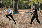 Woman training with resistance band