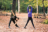 Couple exercising in park