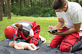 CPR training on baby dummy