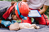 CPR training on baby dummy