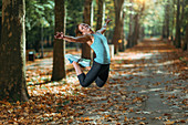 Woman jumping outdoors