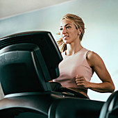 Woman using a treadmill