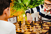Schoolboys playing chess