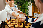 Schoolboys playing chess