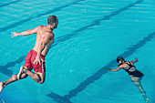 Lifeguard jumping to the rescue