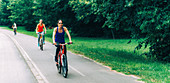 Two women cycling together