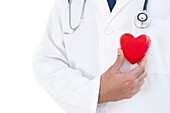 Doctor holding heart shape