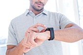 Man checking his smart watch