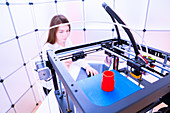 Designer working with 3D printer