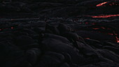 Pahoehoe lava flow at night