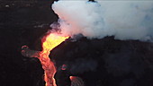 Aerial view of lava fountain and flow