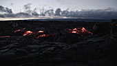 Pahoehoe lava flow at sunset