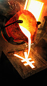 Molten metal pouring into yen sign mold, illustration