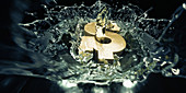 Gold dollar sign falling into water, illustration
