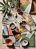 Material and color concept for earthy living rooms (ceramics, textiles, postcards)