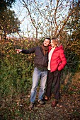 Couple visiting a land in the countryside