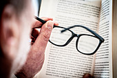 Man reading with glasses