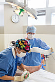 Nurse fitting a DVT prevention system