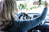 Woman driving her car