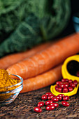 Beta carotene supplement pills and vegetables