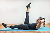 Woman doing high-intensity interval training exercises