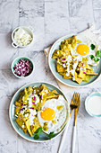 Chilaquiles Verdes - Mexican fried corn chips with tomatillo sauce