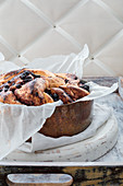 Yeasted babka with blueberry jam in a copper pan