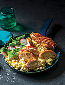 Bacon-wrapped chicken breasts on parmesan parsnip mash
