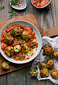 Courgette falafel with tomato sauce