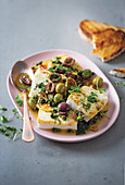 Olive and caper baked halloumi