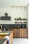 Elegant, custom kitchen and island counter with wooden fronts