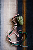 Acorn-shaped Christmas-tree decoration with ribbons