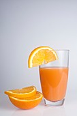 Freshly squeezed orange juice and orange slices