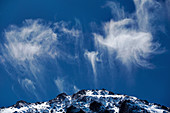 Cirrus spissatus clouds over mountains in New Zealand