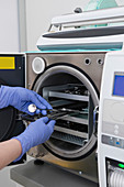 Sterilizing medical instruments in autoclave