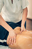 Lower back massage