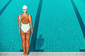 Swimmer next to pool