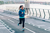 Woman jogging in city