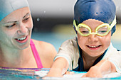 Boy learning to swim