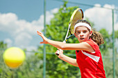 Girl playing tennis