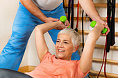Senior woman exercising on pilates ball