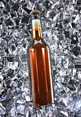 Beer bottle on ice, illustration