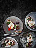 Whipped feta and beetroot on toast with poached eggs and dukkah