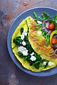 Omelette with spinach and salad