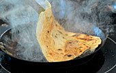 Flatbreads in an frying pan