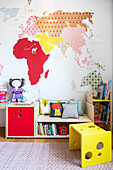 Colourful child's bedroom with DIY map of the world decorating wall