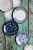Blue-and-white plates and doilies